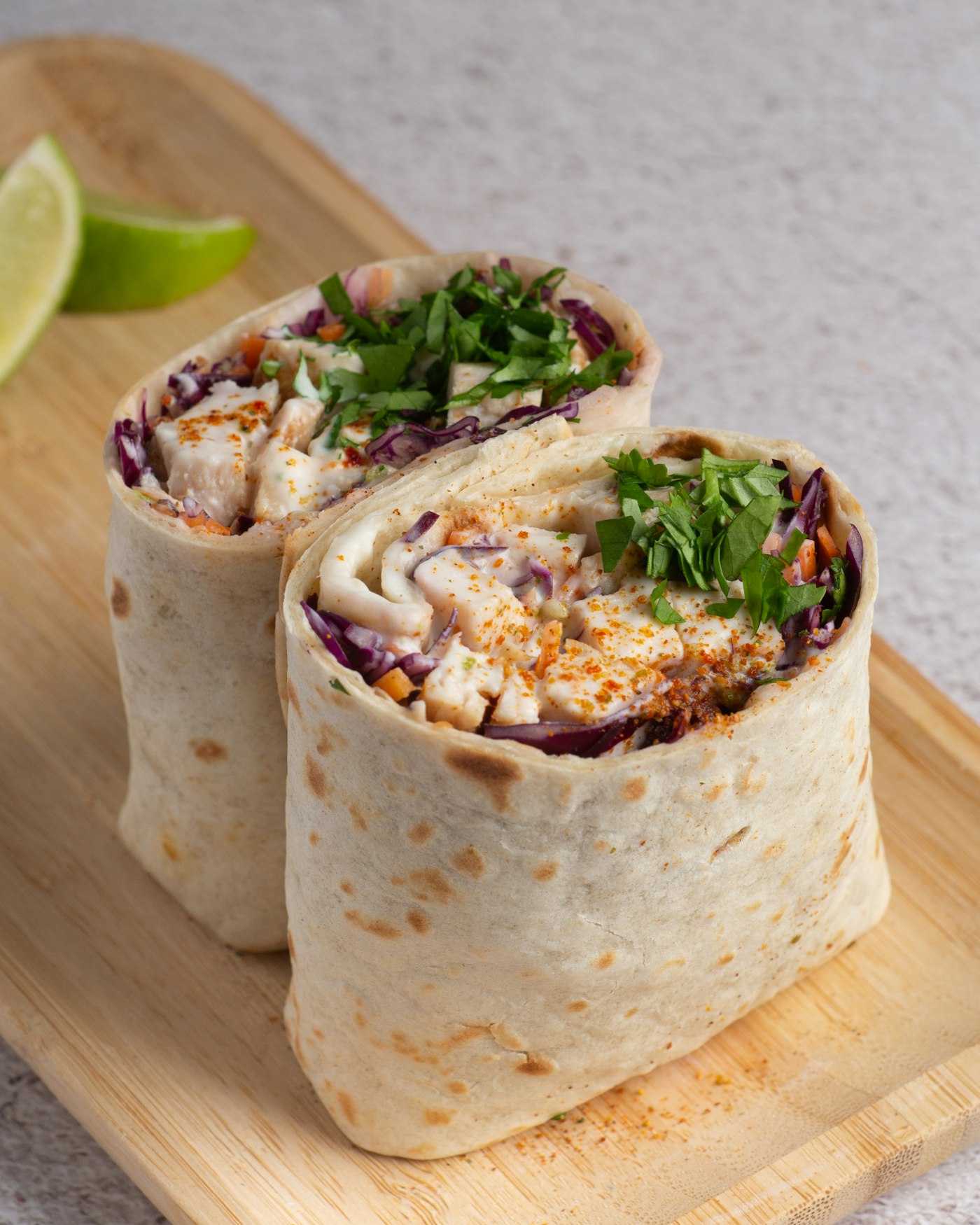 Dürüm wrap filled with chicken and salad